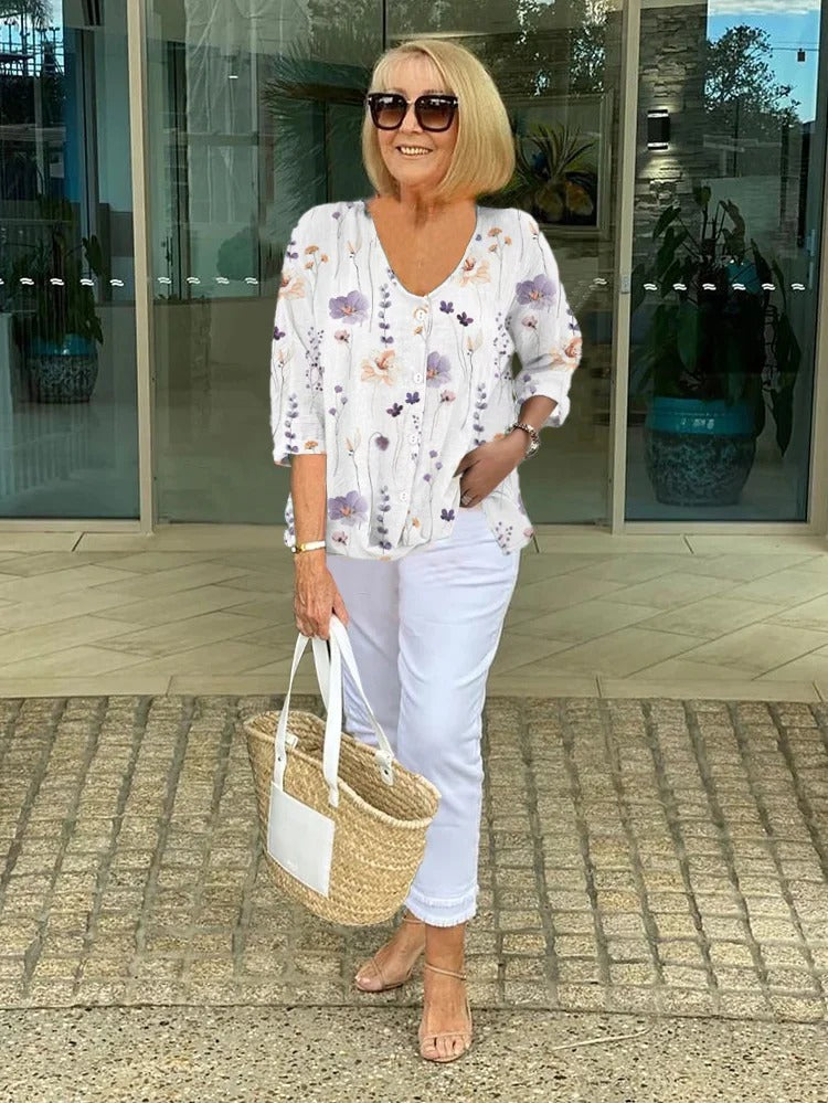 Lualhati – Blusa floral con tapeta de botones
