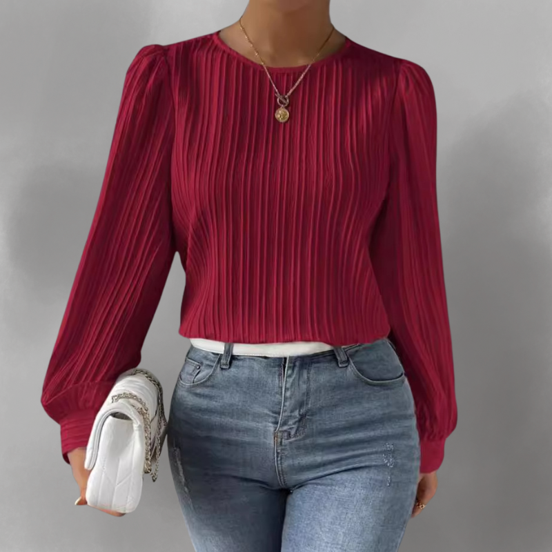 Carly – Blusa plisada de manga larga