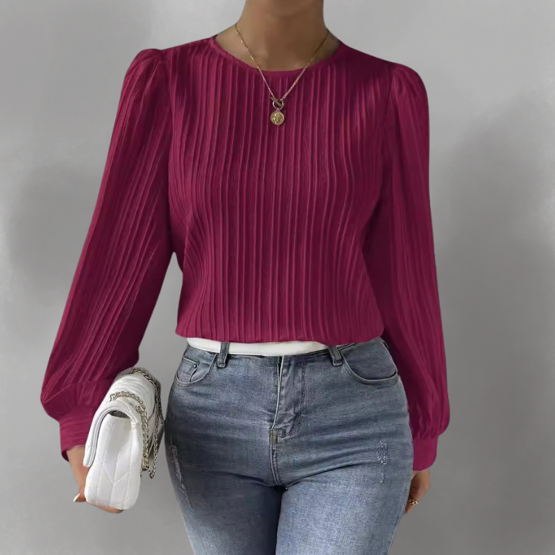 Carly – Blusa plisada de manga larga