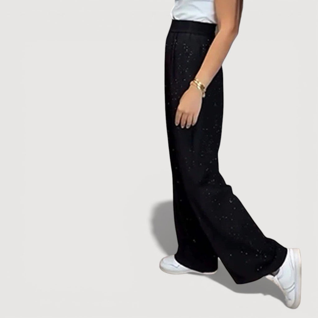 JUVIA – PANTALONES ANCHOS CON BRILLO
