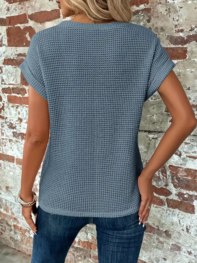 Roselind – Blusa estructurada de manga corta