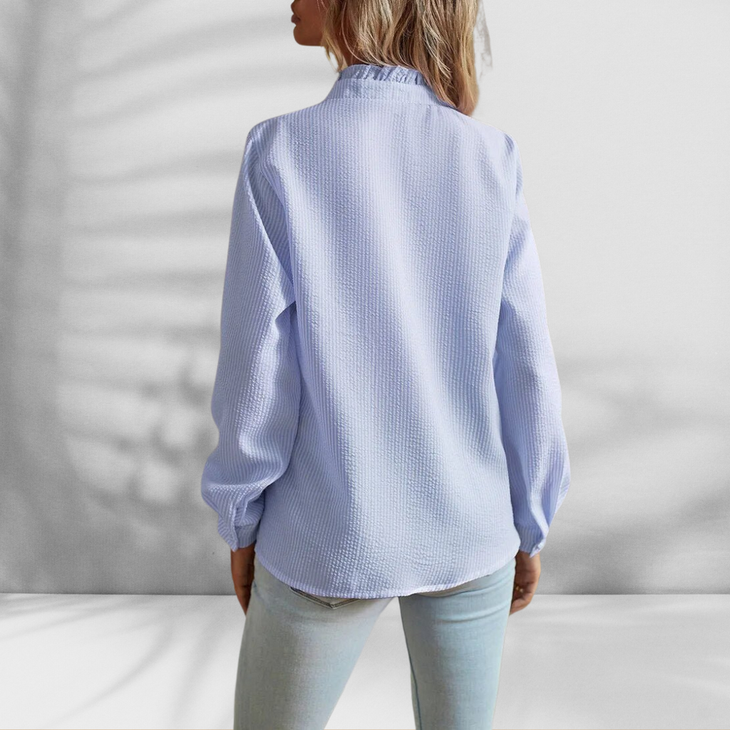 Blusa ligera con detalles de volantes