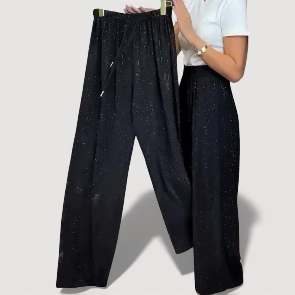JUVIA – PANTALONES ANCHOS CON BRILLO