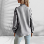 Blusa ligera con detalles de volantes