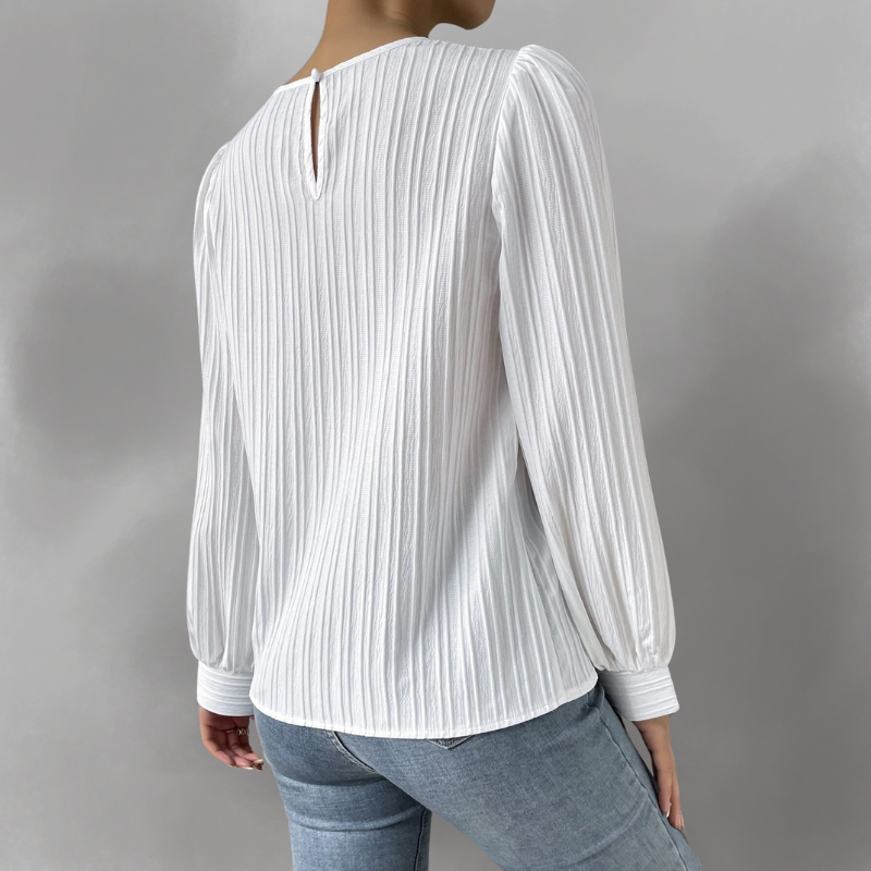 Carly – Blusa plisada de manga larga