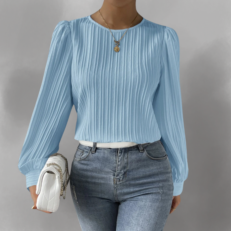 Carly – Blusa plisada de manga larga