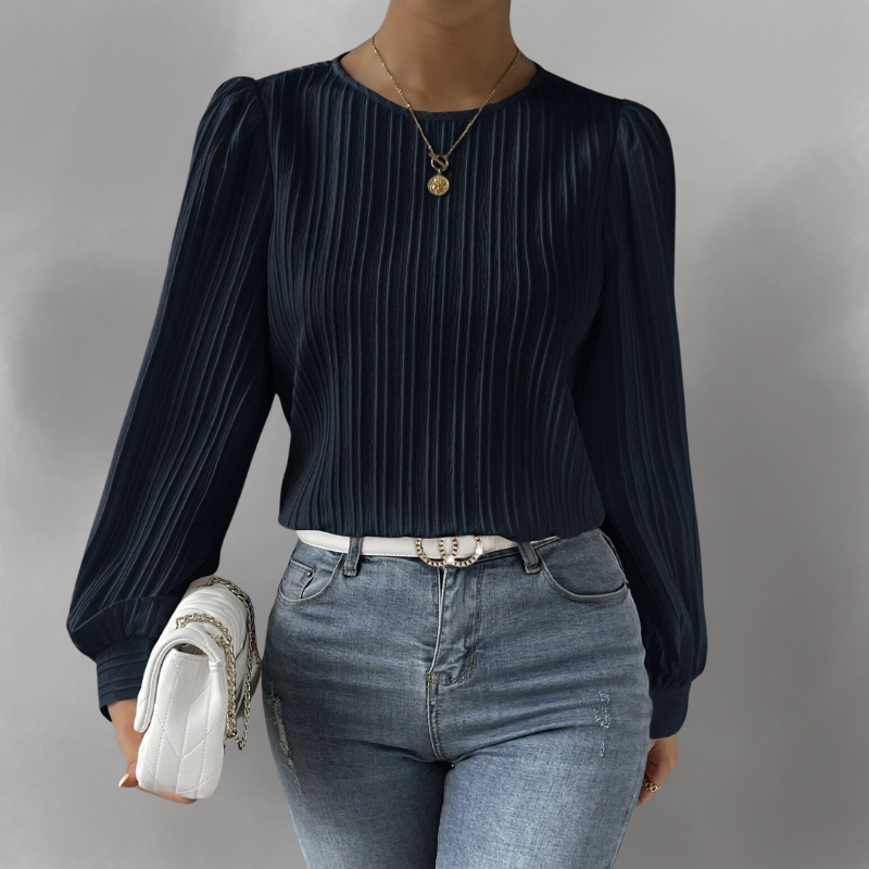 Carly – Blusa plisada de manga larga